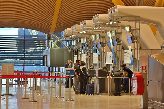Mẫu câu: Can I upgrade to business class?